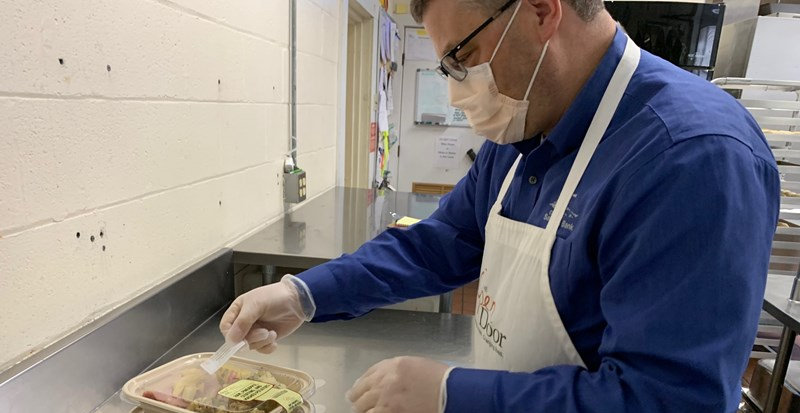 Dennis Acker labels Community Meals