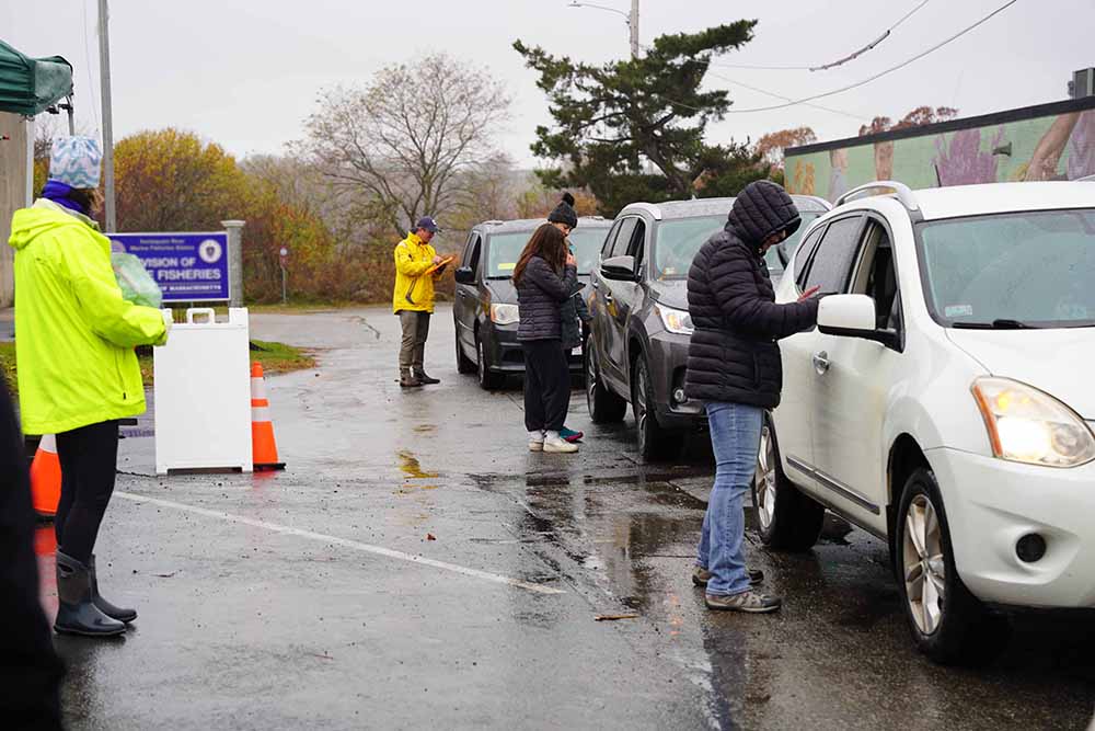 Hundreds of local people picked up Holiday Baskets at no cost on Saturday, kicking off The Open Door Holiday Basket program, which provides everything needed to make a special meal at home for the holidays. (Photo Courtesy of The Open Door) 
